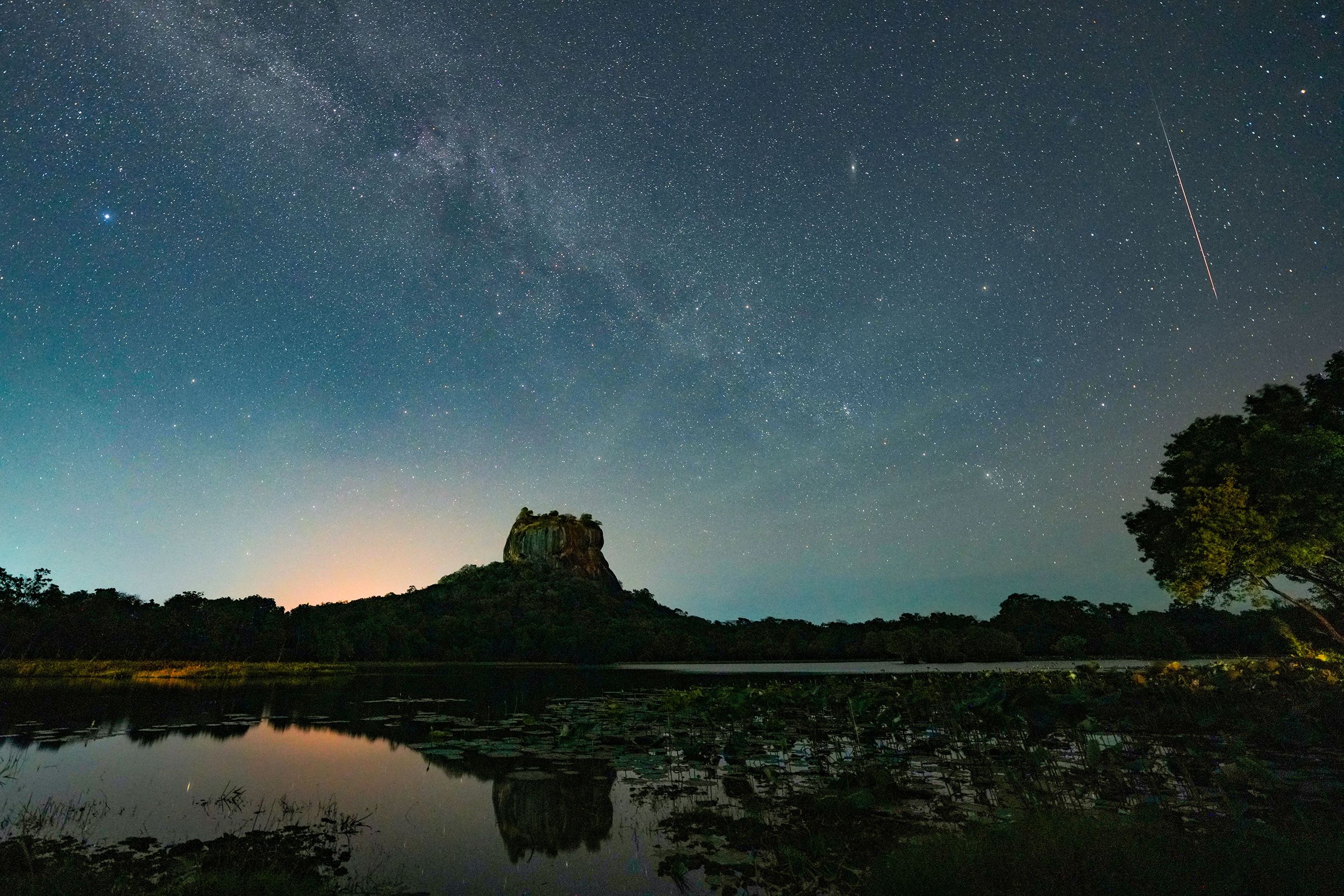 <i>Thilina Kaluthotage/NurPhoto/Shutterstock/FILE via CNN Newsource</i><br/>A Perseid meteor streaks across the sky in Dambulla