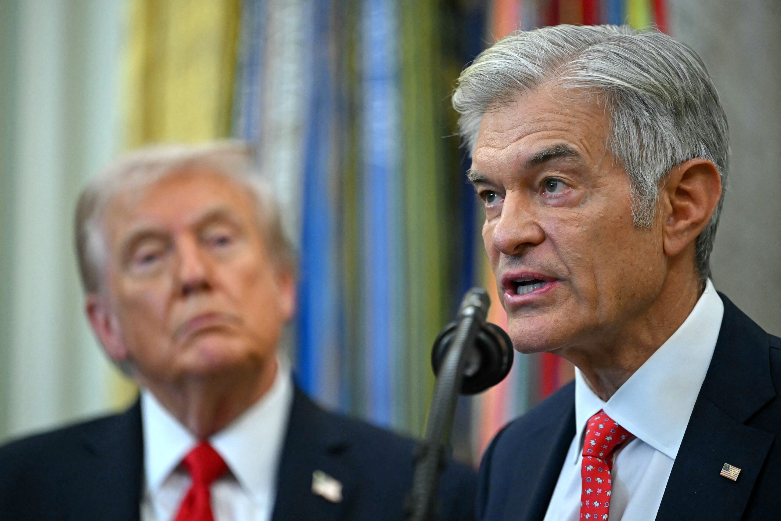 <i>Andrew Caballero-Reynolds/AFP/Getty Images via CNN Newsource</i><br/>President Donald Trump listens to Medicare and Medicaid Administrator Dr. Mehmet Oz during an announcement in the Oval Office on October 16
