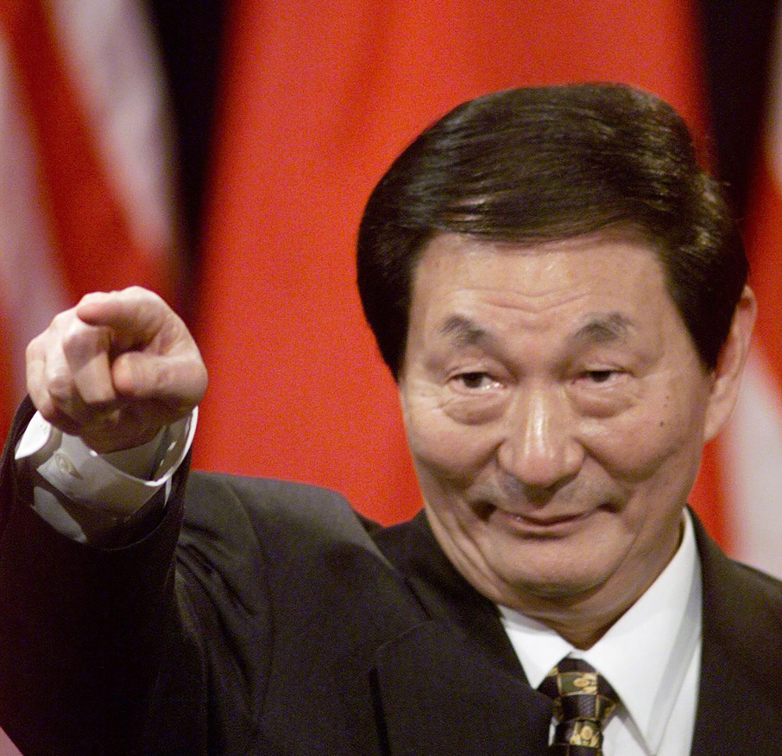 <i>Joyce NALTCHAYAN/AFP/Getty Images via CNN Newsource</i><br/>Chinese Prime Minister Zhu Rongji answers reporters' questions at a joint press conference with US President Bill Clinton in Washington DC in 1999.