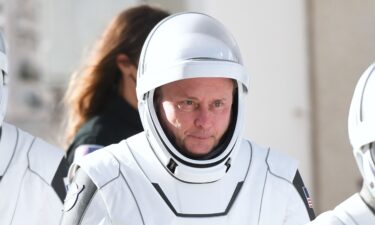 NASA astronaut Mike Fincke steps out of the Neil A. Armstrong Operations and Checkout Building at the Kennedy Space Center in Florida before launch on August 1