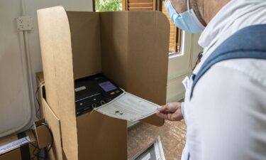 A Puerto Rican casts his vote at a polling station in San Juan