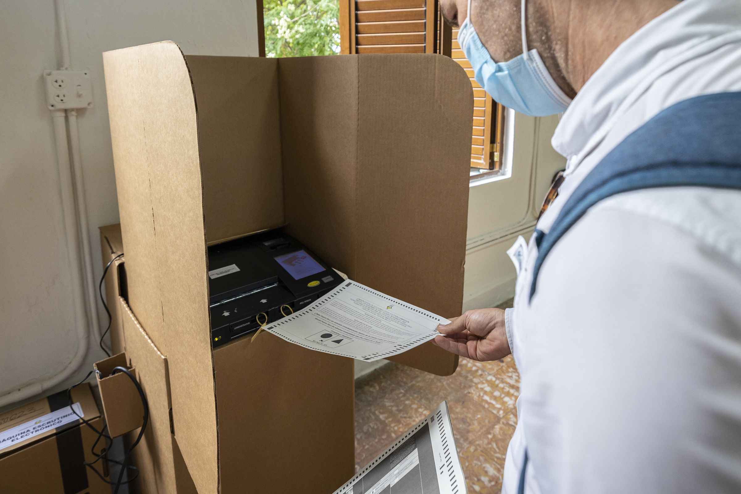 <i>Alejandro Granadillo/Anadolu/Getty Images/File via CNN Newsource</i><br/>A Puerto Rican casts his vote at a polling station in San Juan