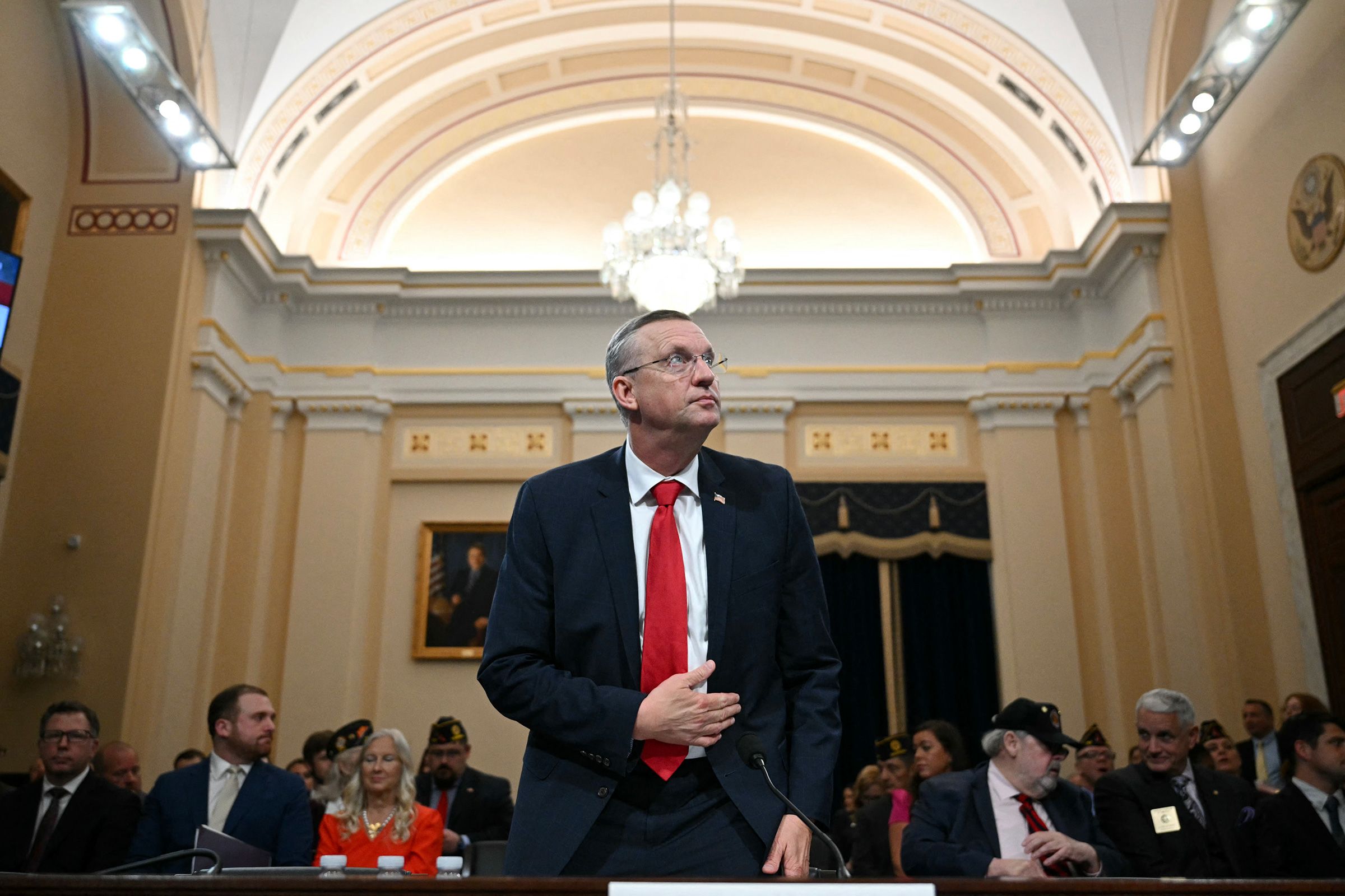 <i>Aaron Schwartz/AFP/Getty Images via CNN Newsource</i><br/>Secretary for Veterans Affairs Doug Collins looks on as President Donald Trump speaks during a Cabinet meeting at Camp David in Maryland