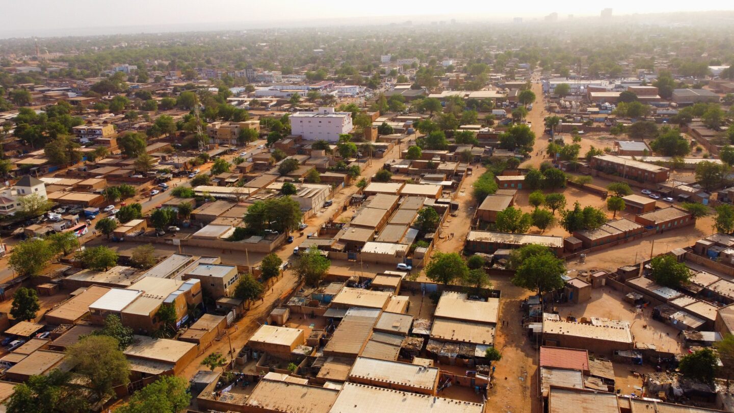<i>Mahamadou Hamidou/Reuters via CNN Newsource</i><br/>A drone picture shows a suburb following the attack on the international airport in Niamey