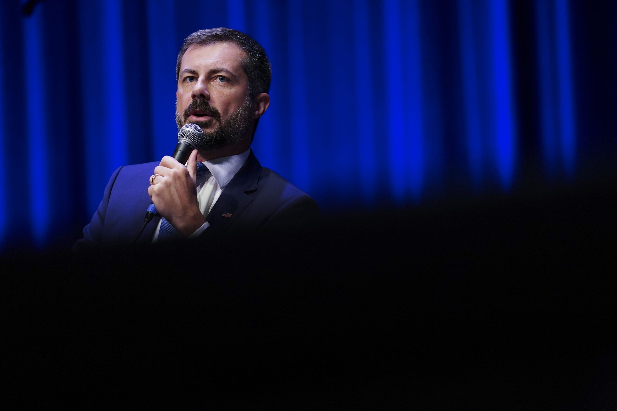 <i>Sean Rayford/Getty Images via CNN Newsource</i><br/>Former US Transportation Secretary Pete Buttigieg speaks during the Spratt Issues Conference at the Francis Marion University Performing Arts Center on August 22 in Florence