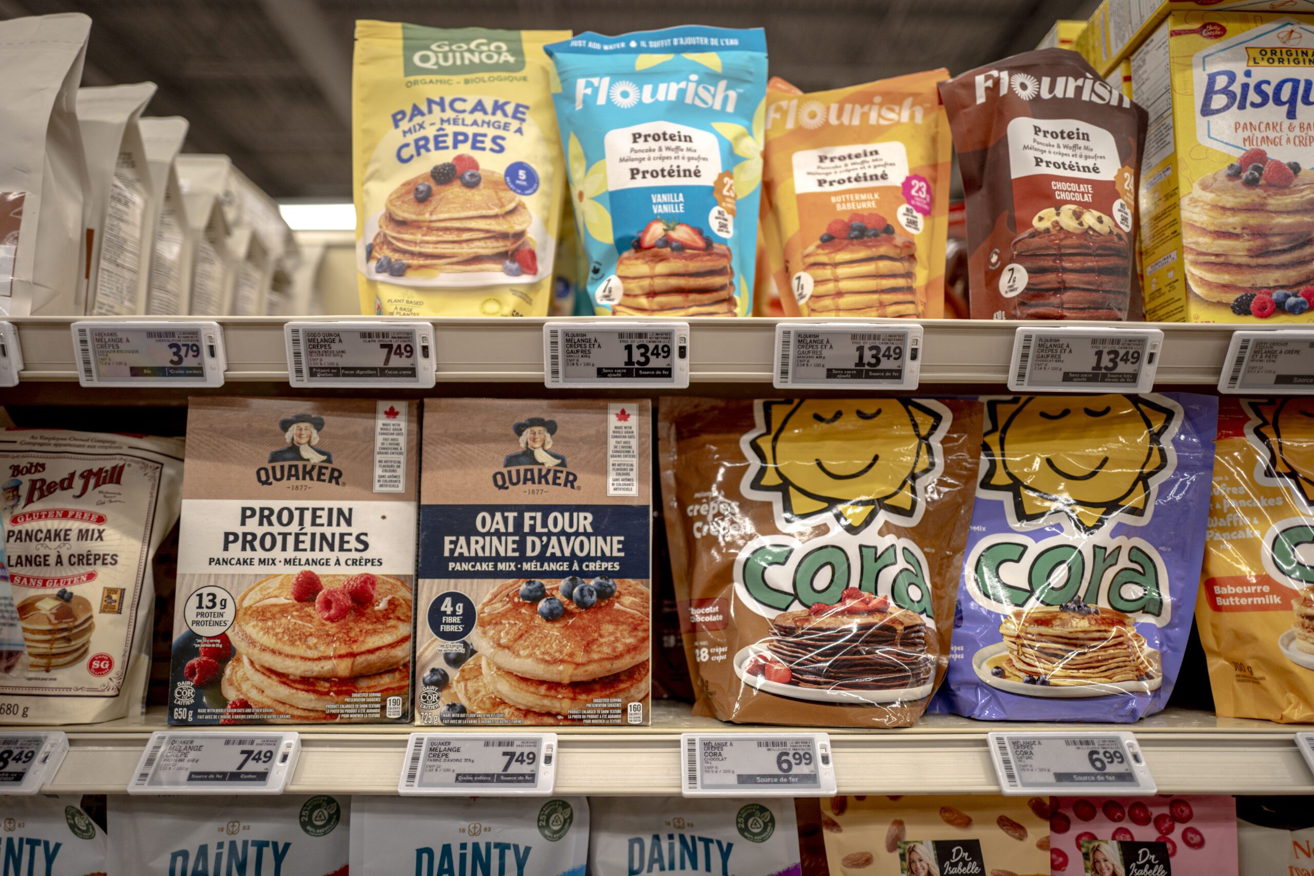 <i>Andrej Ivanov/AFP/Getty Images via CNN Newsource</i><br/>An American brand and the Canadian version at a grocery store in Montreal