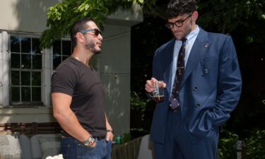Abdul El-Sayed talks with streamer Hasan Piker at a party for content creators supporting his campaign on August 3 in Detroit.