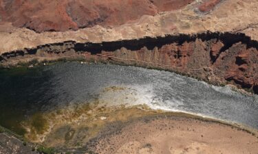 The Colorado River snakes through the canyon as seen from the south rim of Grand Canyon National Park near Tusayan