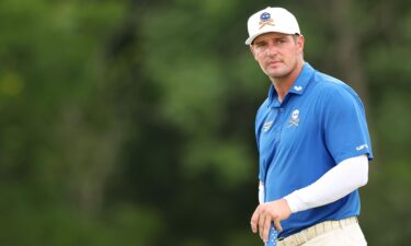 Jon Rahm plays a tee shot during a LIV Golf event in Westfield
