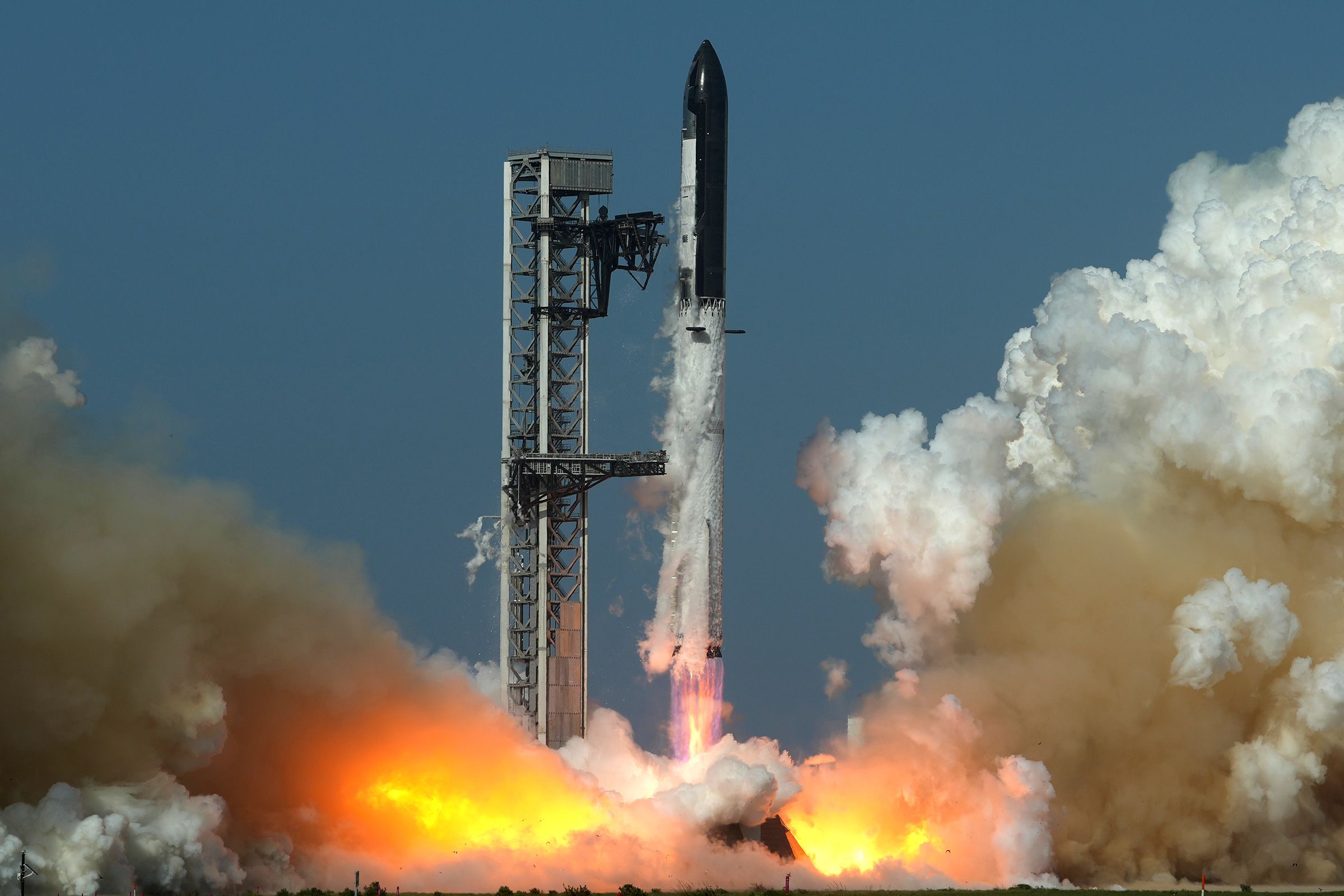 <i>Eric Gay/AP/File via CNN Newsource</i><br/>SpaceX's Starship rocket lifts off for a test flight from Starbase