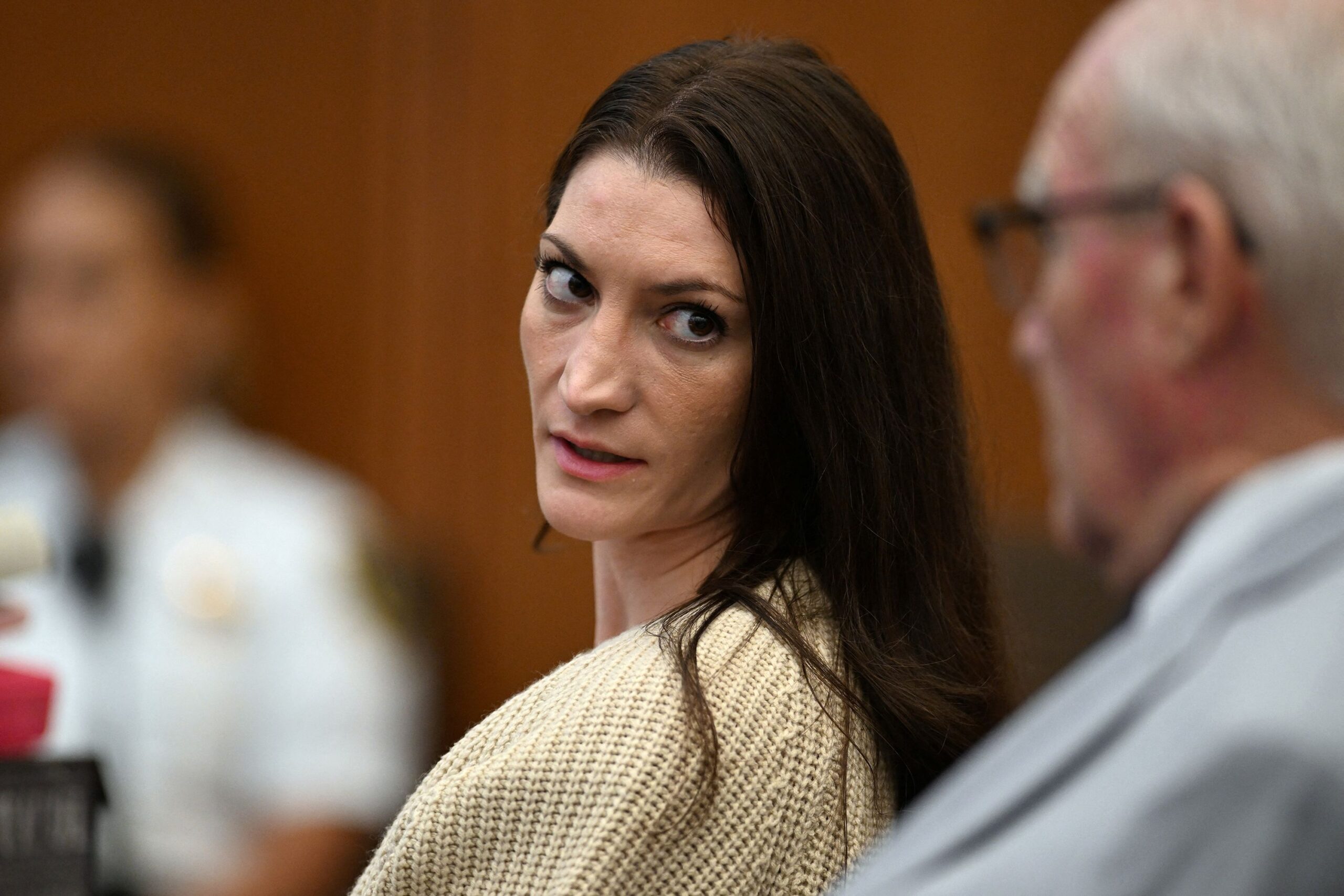<i>Josh Reynolds/Pool/Reuters via CNN Newsource</i><br/>Lindsay Clancy speaks with her lawyer Kevin Reddington during proceedings in her murder trial