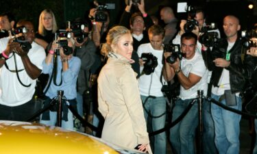 Hayden Panettiere poses for photographers as she arrives at a party to celebrate the opening of the Lamborghini Calabasas dealership in Calabasas In November 2007.