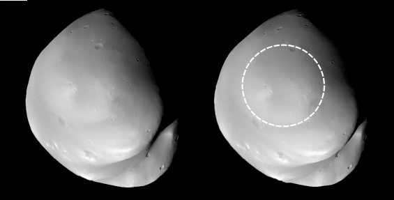 <i>S. D. Raducan/ESA via CNN Newsource</i><br/>Animation shows how an asteroid strike may have reshaped Deimos and cloaked it in dusty material.