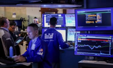 Traders work on the floor of the New York Stock Exchange (NYSE) in New York