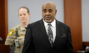 A screen shows a transcript of a 2008 recording of an interview with Duane Davis and law enforcement