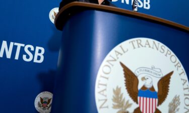 The National Transportation Safety Board logo and signage seen at a news conference at NTSB headquarters in Washington