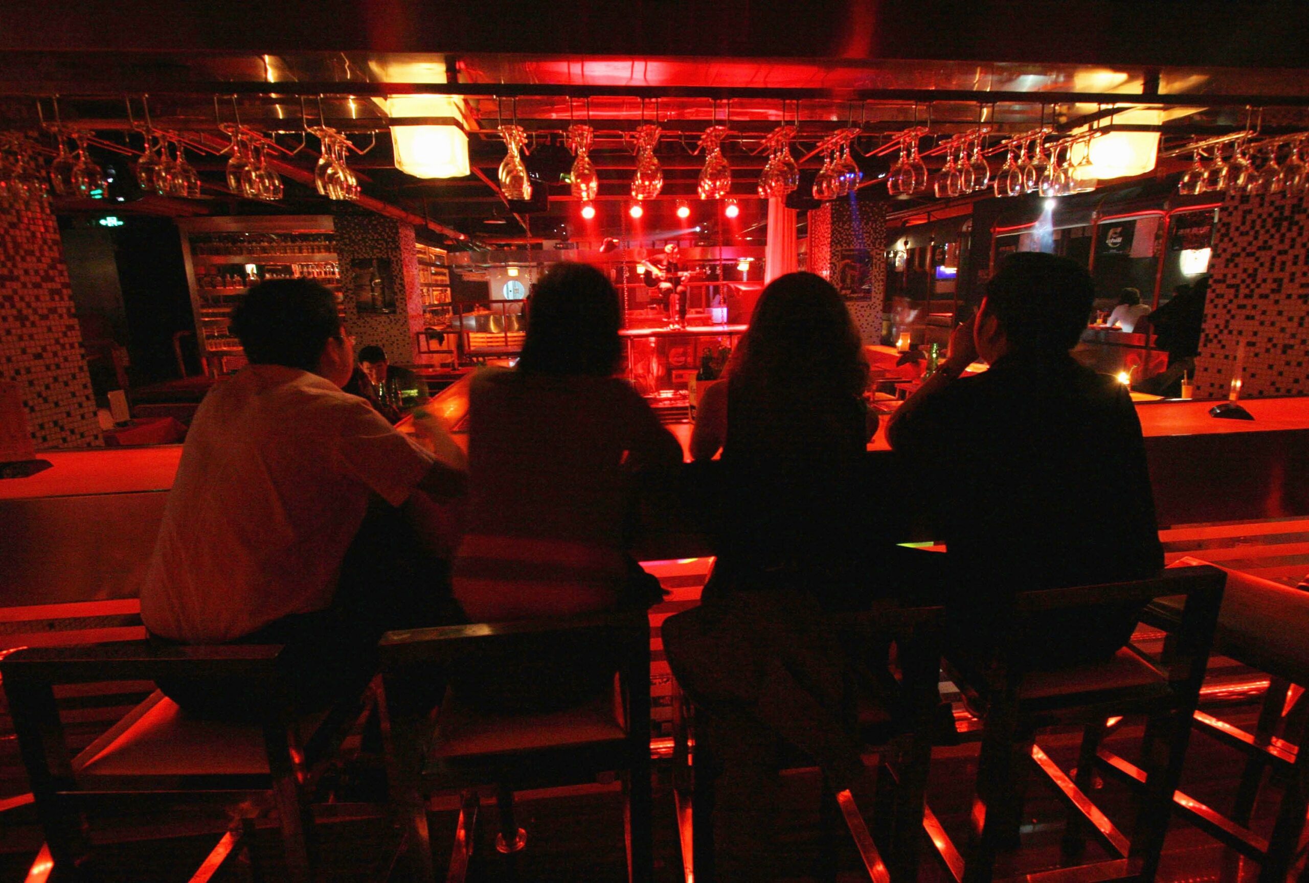 <i>China Photos/Getty Images via CNN Newsource</i><br/>People drink at a bar in western China's Qinghai province last year.