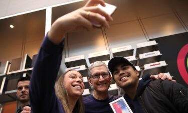 Cook shows off the new iPhone 6 and the Apple Watch on September 9