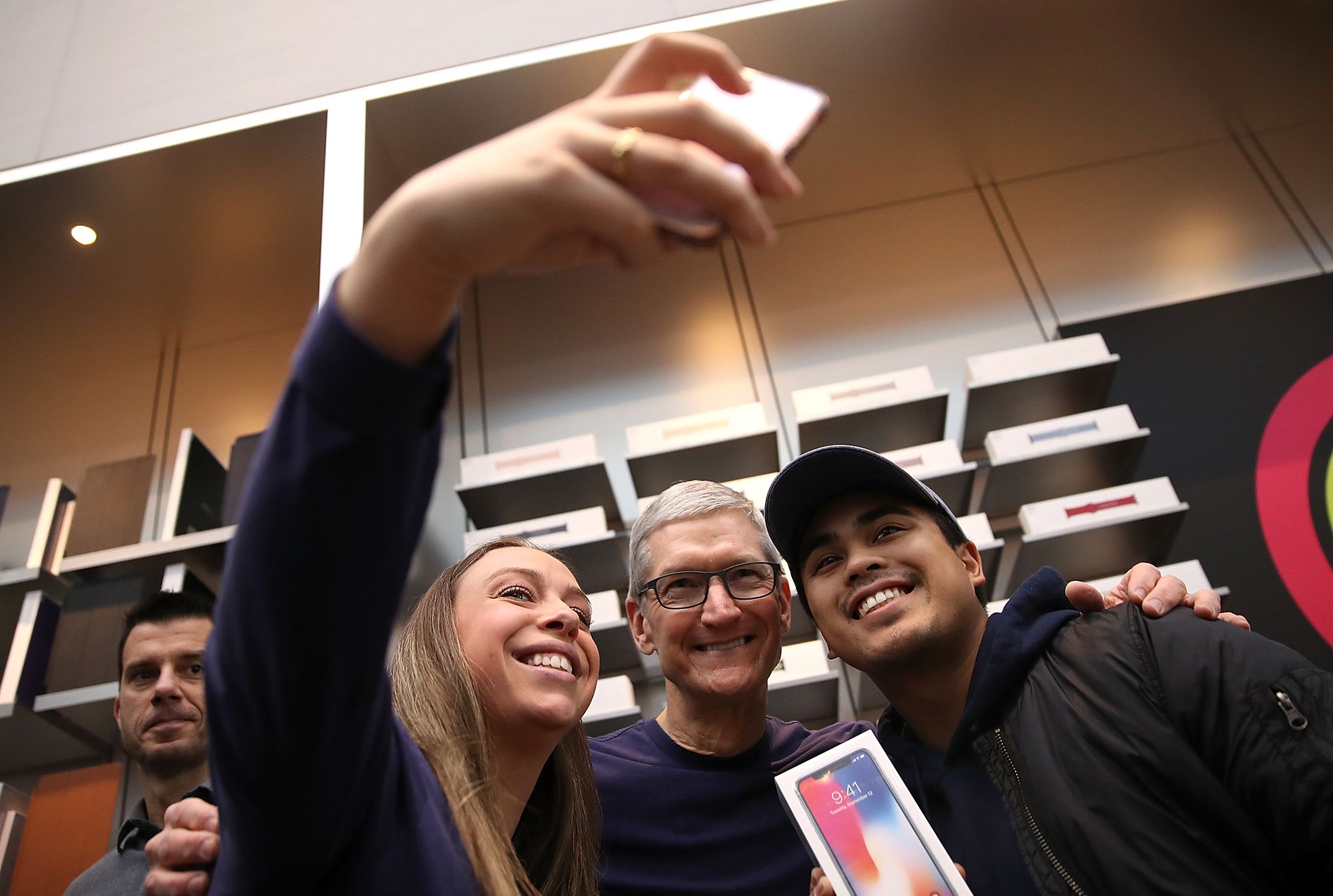 <i>Justin Sullivan/Getty Images via CNN Newsource</i><br/>Cook shows off the new iPhone 6 and the Apple Watch on September 9