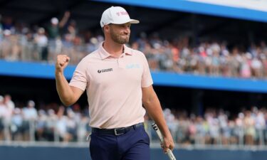 Wyndham Clark celebrates after winning the BMW Championship on Sunday.