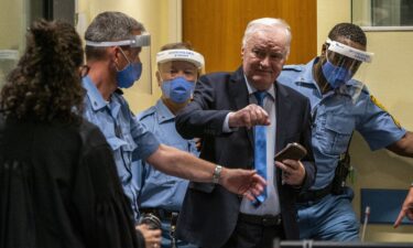 Mladic arrives in the courtroom prior to the hearing of the final verdict on appeal against his genocide conviction over the 1995 Srebrenica massacre