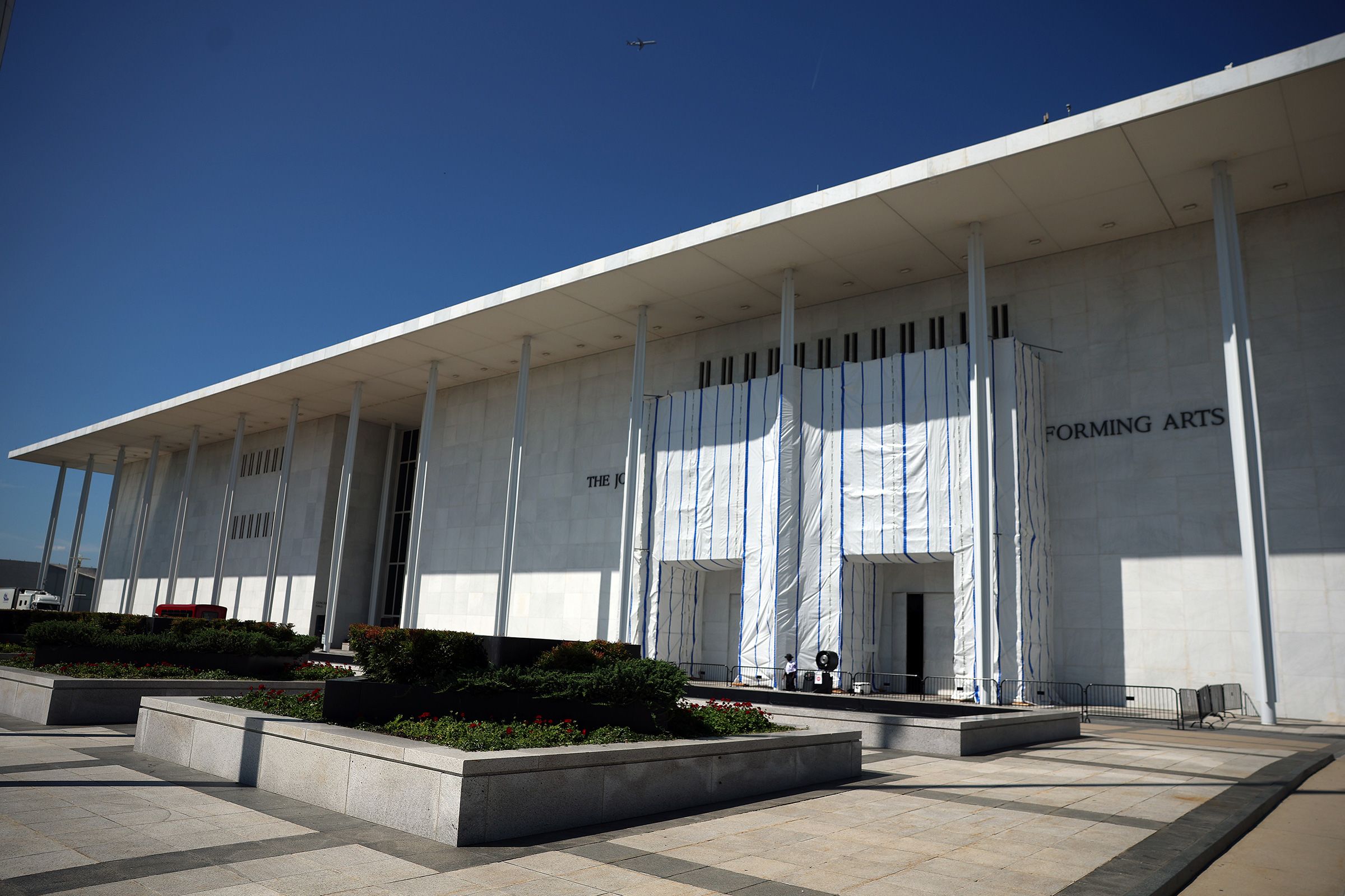 <i>Kevin Dietsch/Getty Images via CNN Newsource</i><br/>A tarp remains in place on the facade of the John F. Kennedy Center for the Performing Arts in Washington