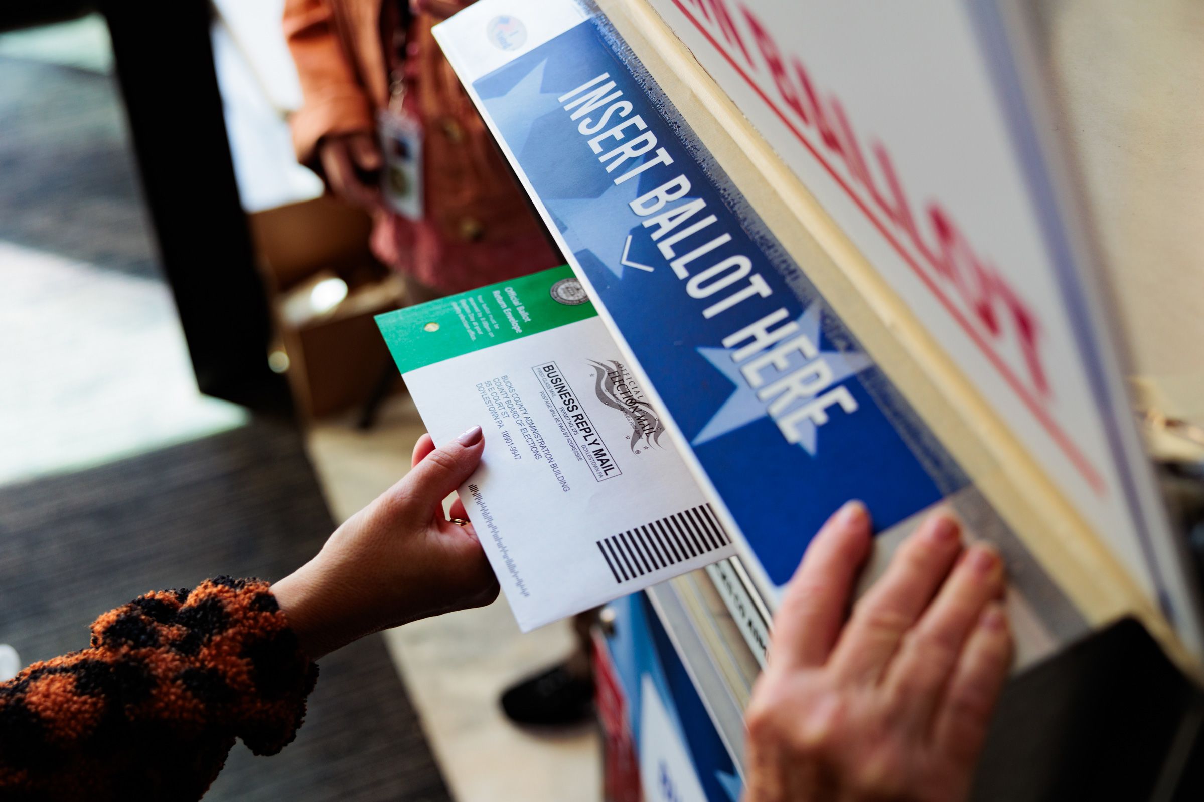 <i>Hannah Beier/Getty Images/File via CNN Newsource</i><br/>A federal judge in Boston has temporarily blocked the US Postal Service from carrying out its plan that could limit mail voting. In this October 15