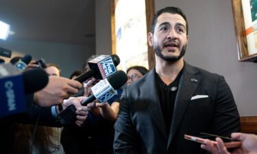 Abdul El-Sayed speaks to reporters at the Michigan Democratic Party's 2026 convention in Lansing on August 29.