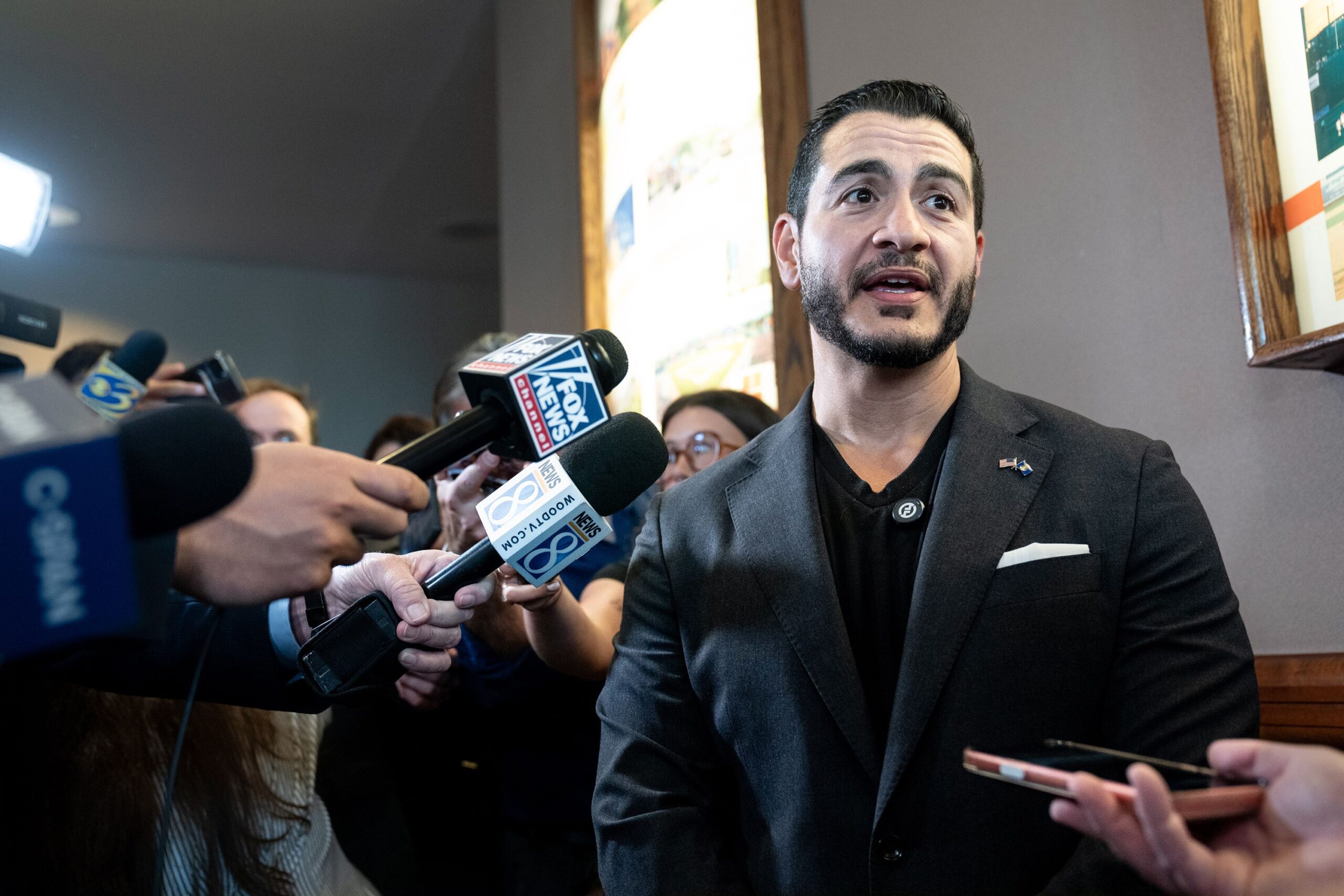 <i>Sarah Rice/Bloomberg/Getty Images via CNN Newsource</i><br/>Abdul El-Sayed speaks to reporters at the Michigan Democratic Party's 2026 convention in Lansing on August 29.