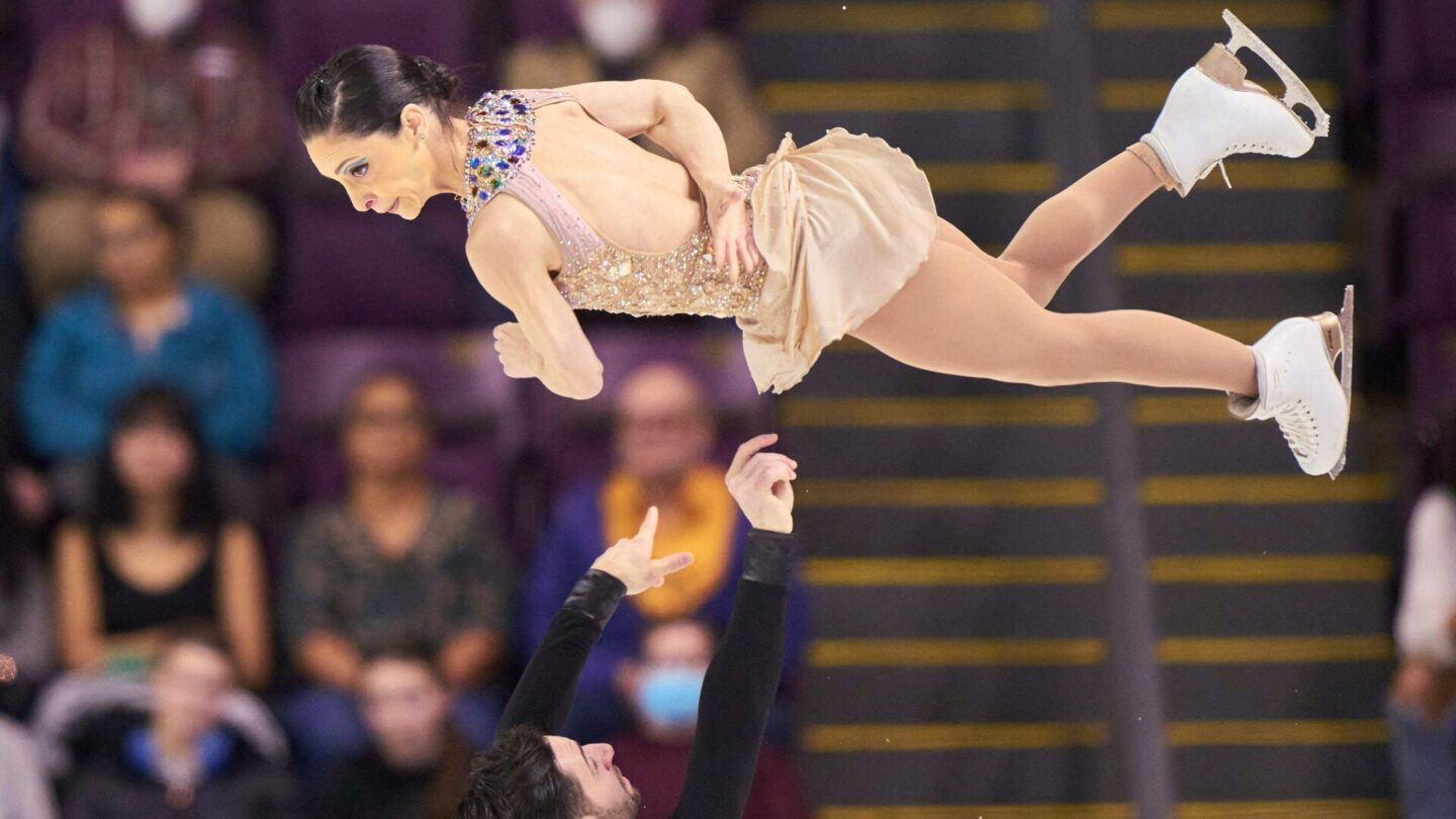 Canada's Deanna Stellato-Dudek (top) and Maxime Deschamps compete in their free skate in the pairs event during the ISU Four Continents Figure Skating Championships 2023 at the Broadmoor World Arena in Colorado Springs