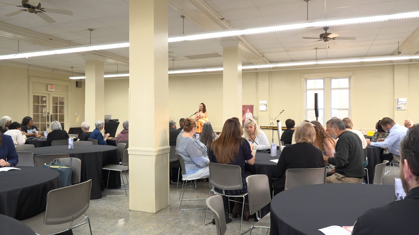 Danielle Brown speaking at the 30th annual day of commitment to eliminate racism.