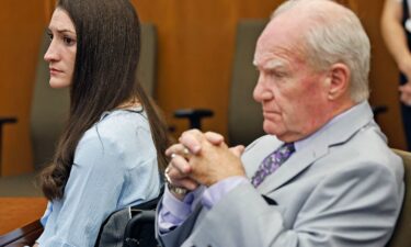 Lindsay Clancy and attorney Kevin Reddington watch jurors as Judge William Sullivan asks them to continue deliberations. The jury has come back for the second time to say they could not reach a unanimous verdict.