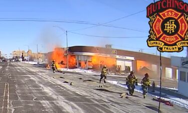 Firefighters run as building explodes after gas leak in February 2025.
