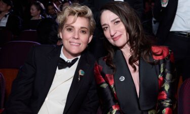 Sara Bareilles (right) is shown with Brandi Carlile at the Oscars in March. They collaborated on the song “Salt Then Sour Then Sweet” with the late poet Andrea Gibson.