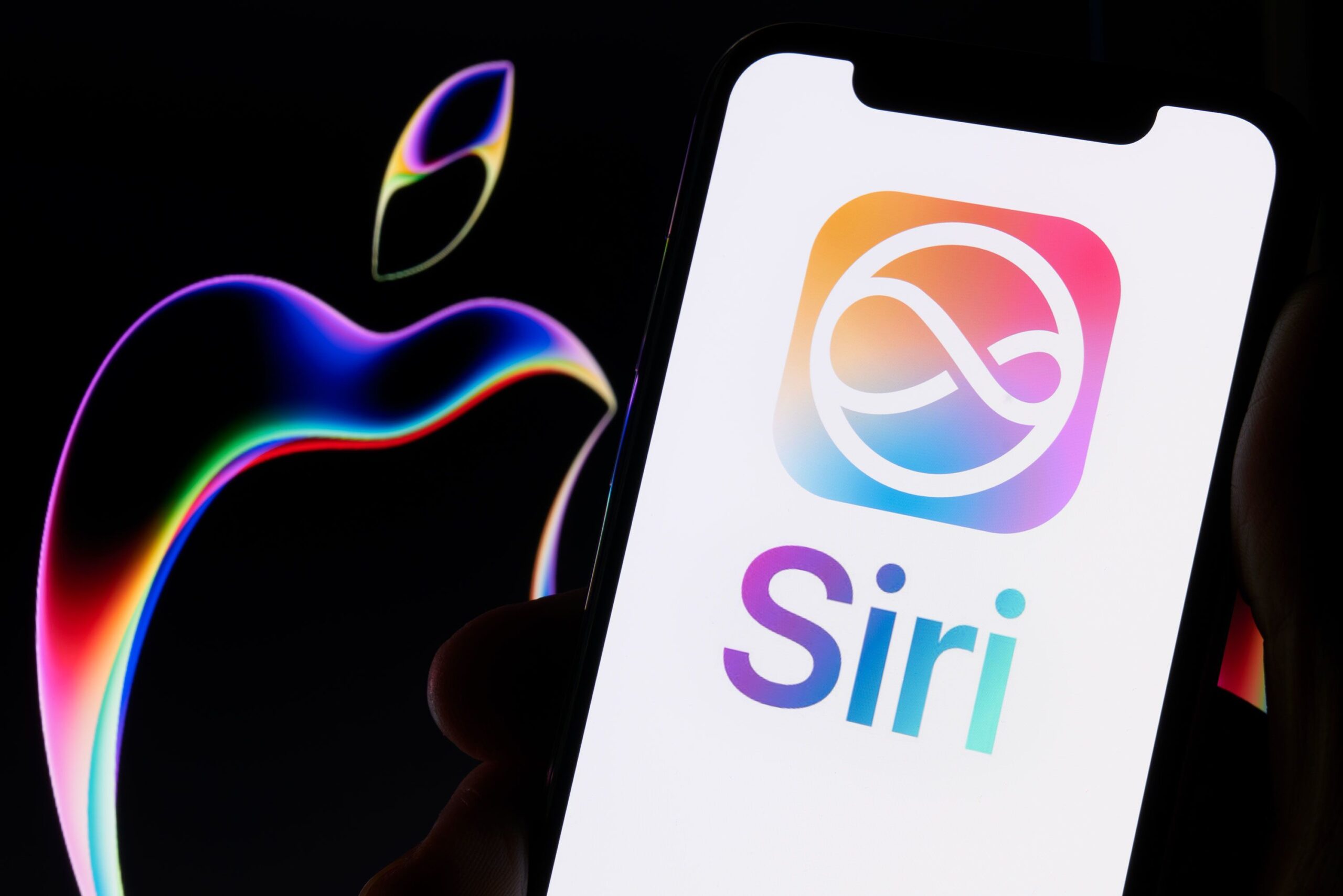 <i>Jeff Chiu/AP via CNN Newsource</i><br/>Apple CEO John Ternus waves on stage during an announcement of new products on September 9