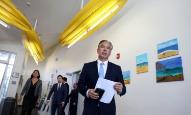 California Attorney General Rob Bonta (C) speaks alongside Colorado Attorney General Phil Weiser (L) and New Jersey Attorney General Jennifer Davenport after opening arguments took place in the Meta trial