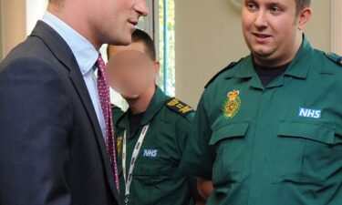 Prince Harry speaks to ambulance crew members