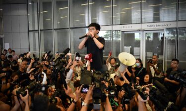 Hong Kong activist Joshua Wong prepares to board a prison van in 2020 in Hong Kong.