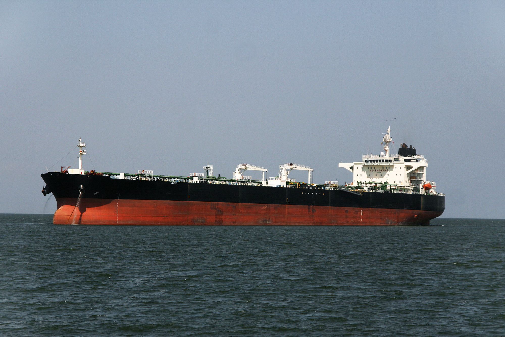 <i>Humberto Matheus/Sipa USA/AP via CNN Newsource</i><br/>An oil tanker chartered by Chevron is anchored in Lake Maracaibo