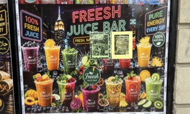 An AI ad for "Freesh Juice Bar" outside of a Brooklyn bodega featured some impossible looking creations.