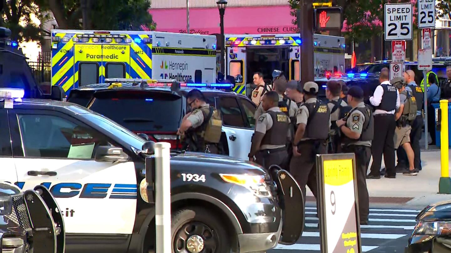 <i>WCCO via CNN Newsource</i><br/>Law enforcement responds near the scene of a reported officer-involved shooting in downtown Minneapolis on Wednesday