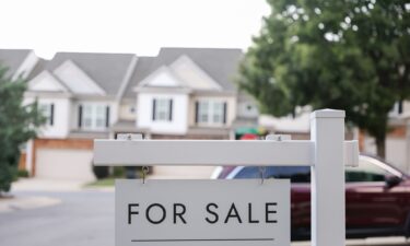 A "For Sale" sign in front of a home in Charlotte