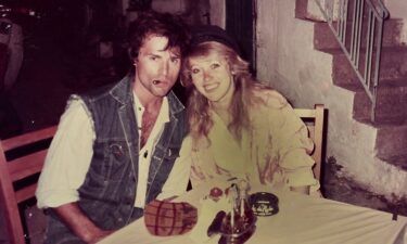 Chuck is a photographer and he took this photo of Diane with one of their daughters in 1991.