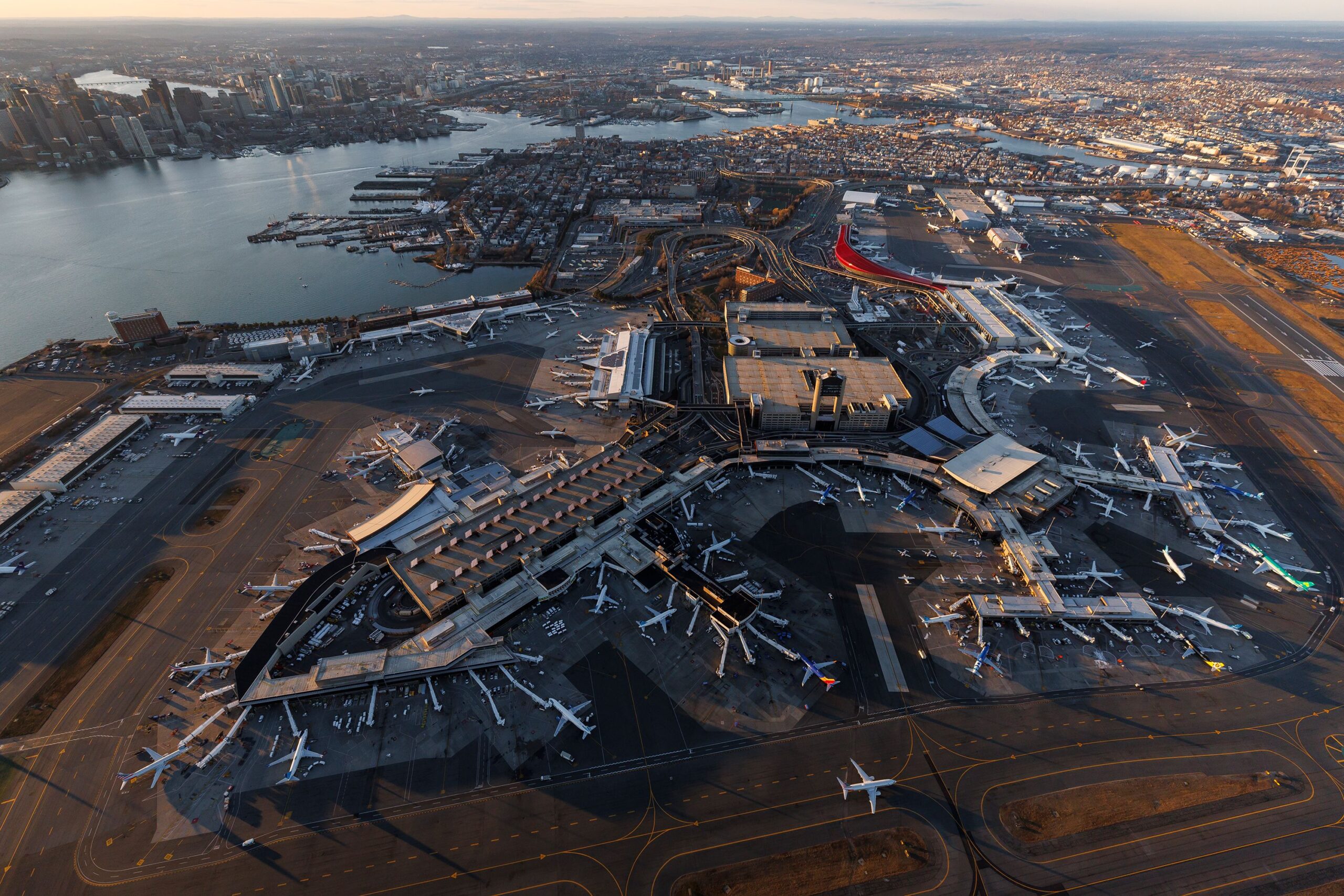 <i>Austin DeSisto/NurPhoto/Getty Images via CNN Newsource</i><br/>An aerial view shows the entirety of Boston Logan International Airport in December 2025.