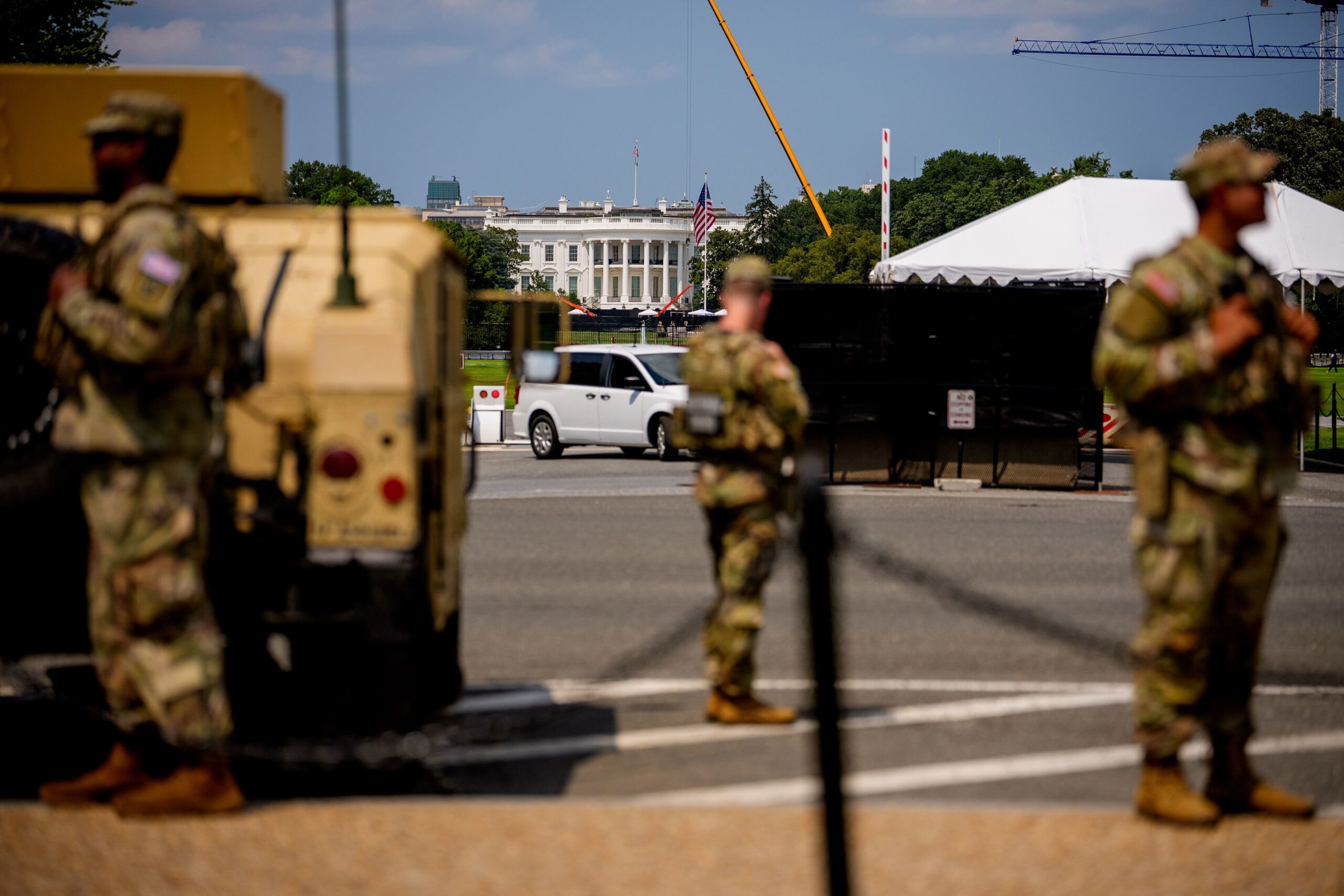 <i>Andrew Harnik/Getty Images via CNN Newsource</i><br/>National Guard troops stand along Constitution Avenue on August 12