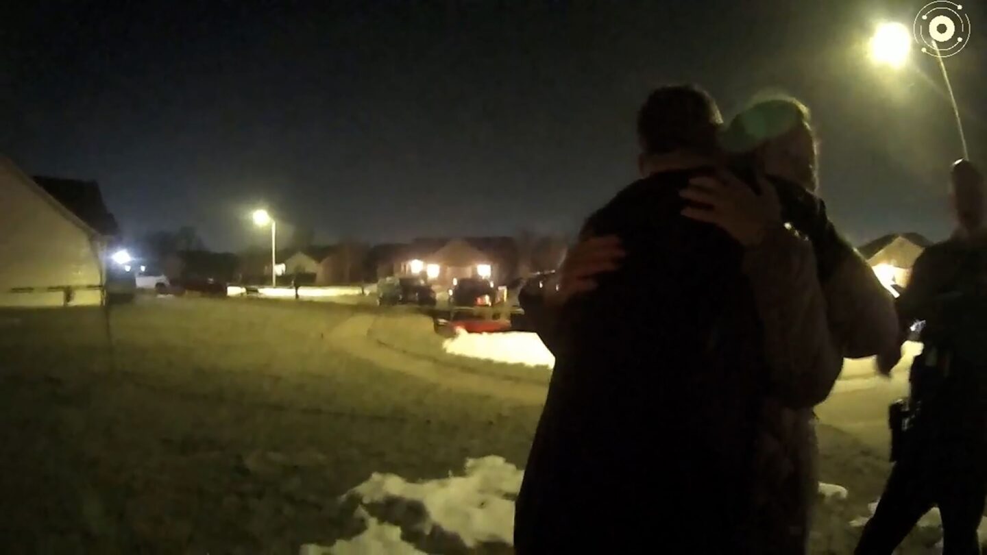 <i>Tipp City Police Department via CNN Newsource</i><br/>Caleb Flynn embraces his mother-in-law as law enforcement investigate the killing of his wife in February 2026.