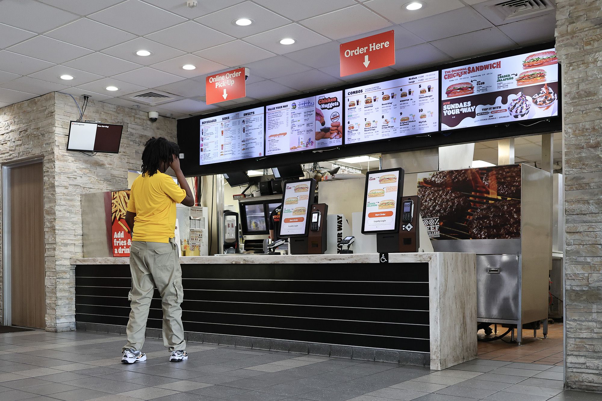 <i>Joe Raedle/Getty Images via CNN Newsource</i><br/>A customer visits a Burger King restaurant on August 17 in Miami