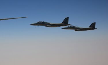 F-15SA fighter jets from the Royal Saudi Air Force escort Air Force One ferrying US President Donald Trump as they prepare to land at King Khalid International Airport on May 13