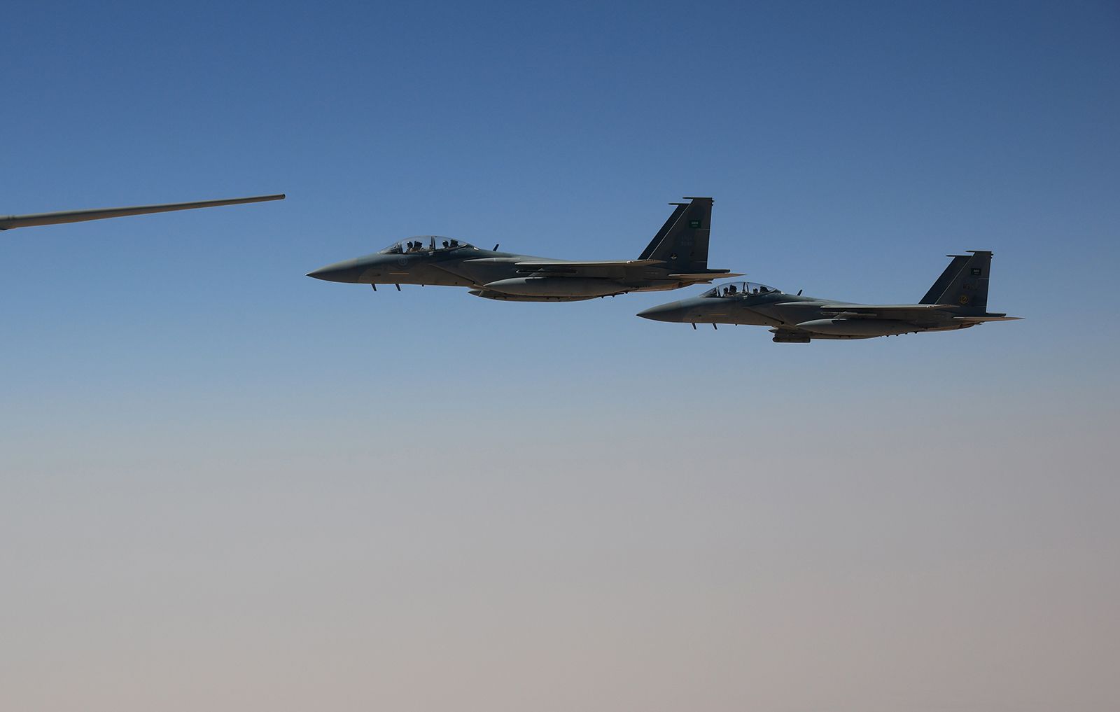 <i>Win McNamee/Getty Images via CNN Newsource</i><br/>F-15SA fighter jets from the Royal Saudi Air Force escort Air Force One ferrying US President Donald Trump as they prepare to land at King Khalid International Airport on May 13