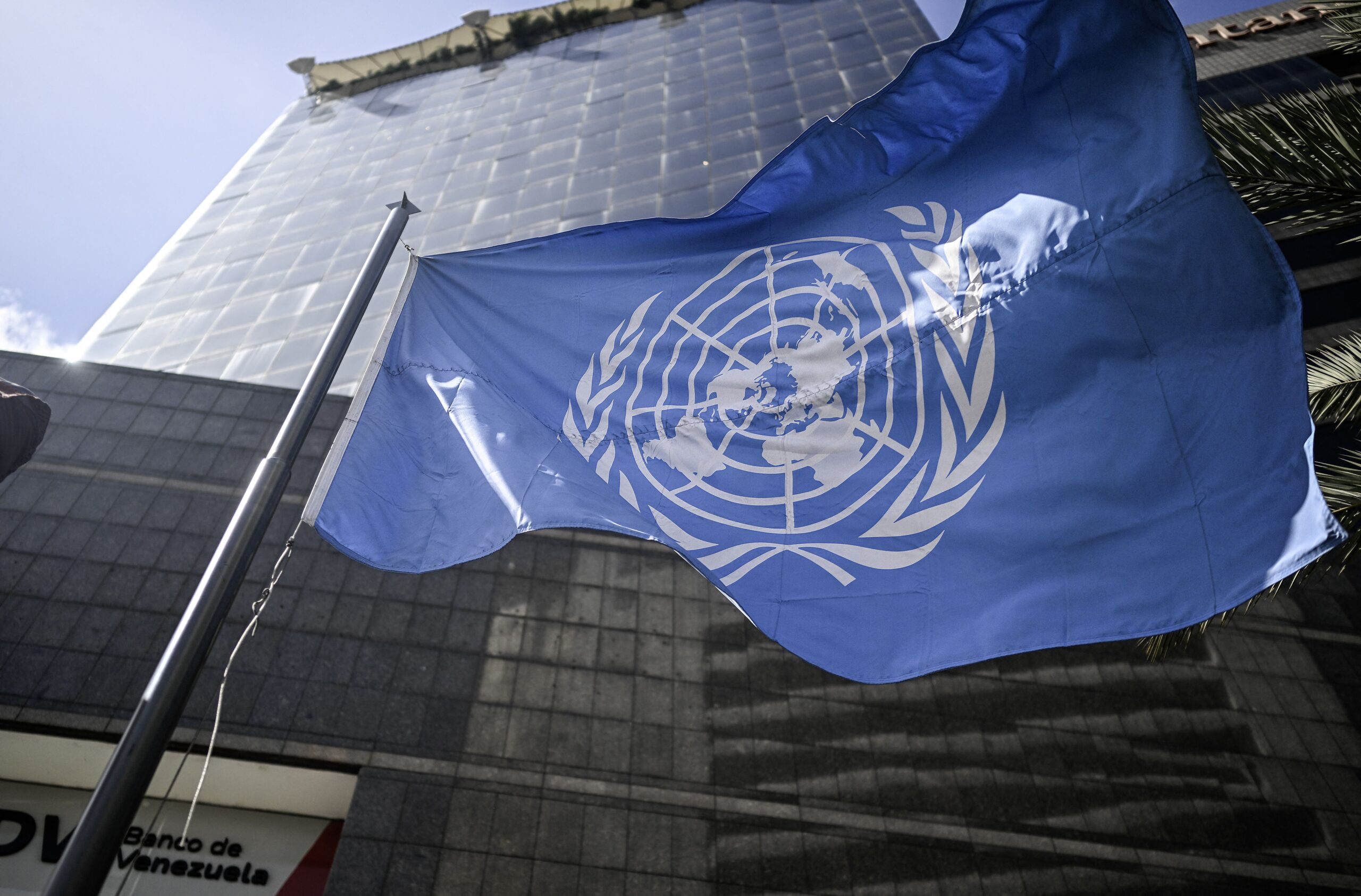 <i>Juan Baretto/AFP/Getty Images via CNN Newsource</i><br/>The United Nations flag waves in front of its office building on December 16